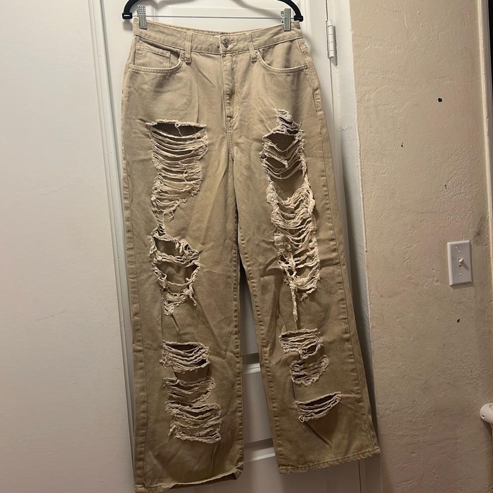 Tan ripped jeans